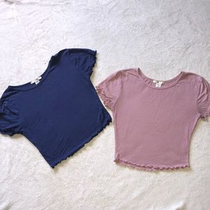 2 crop tops. Grew out of them. Hardly worn.